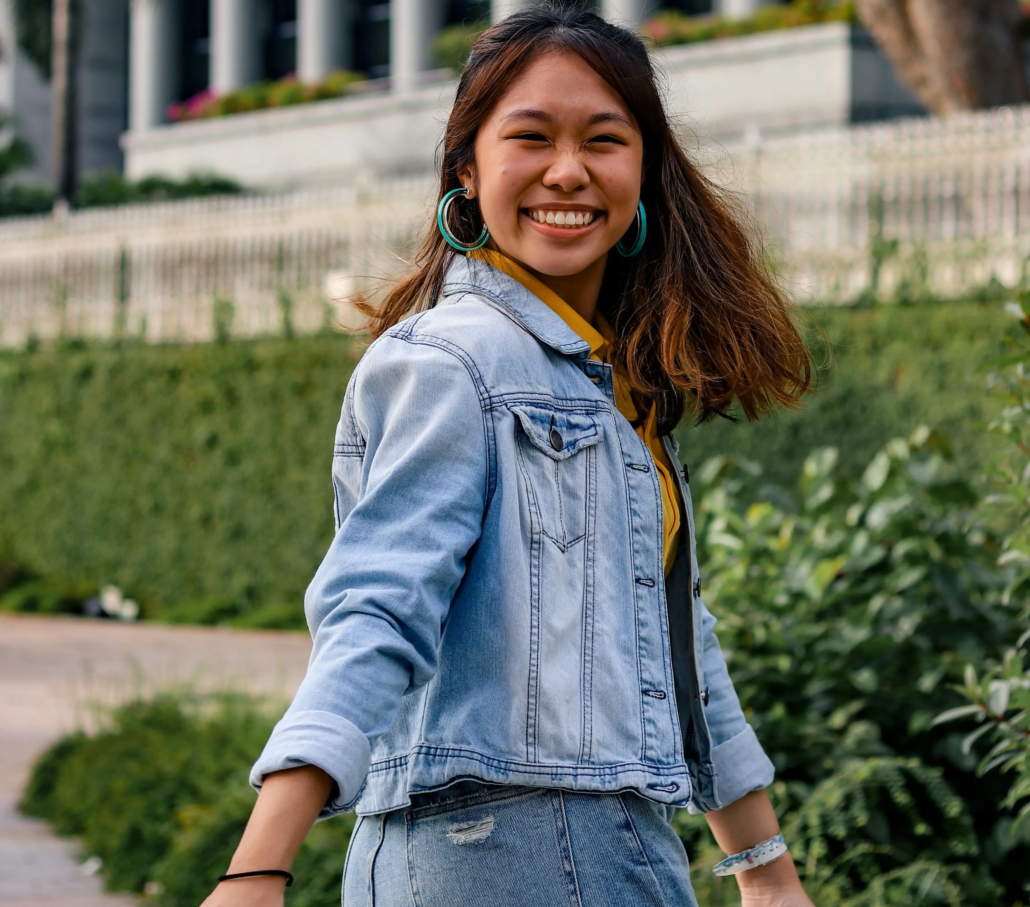 young woman smiling in outdoor environment